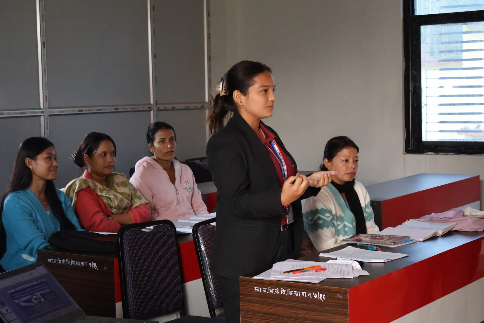 a women standing and talking