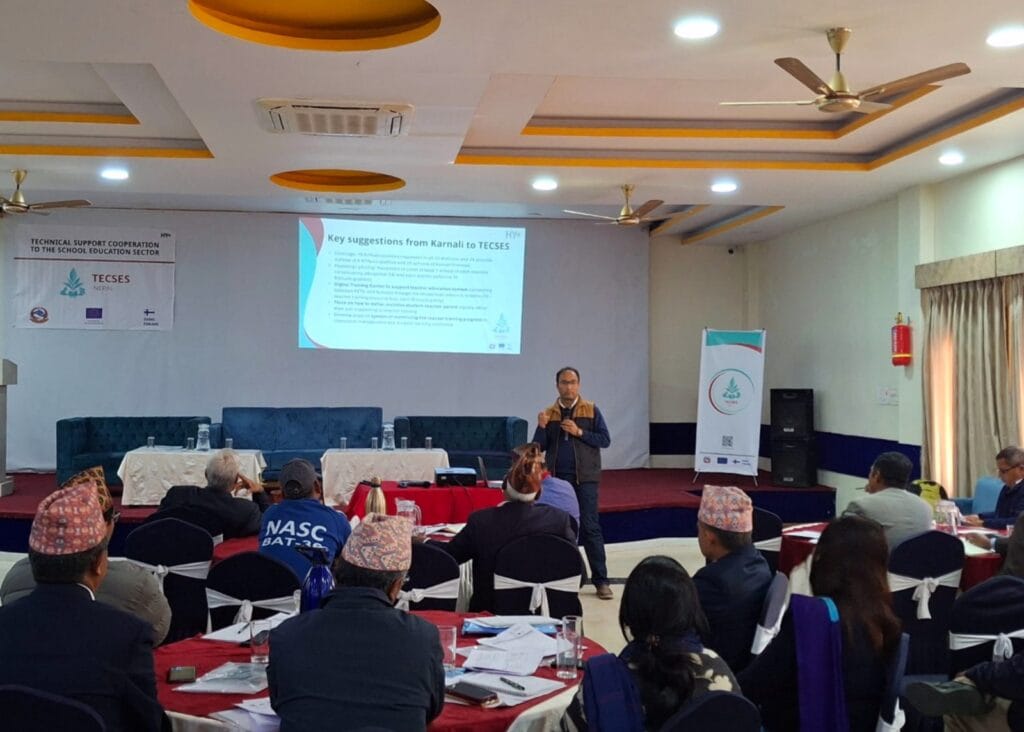 Dr. Prem Aryal making a presentation at the event in front of an audience