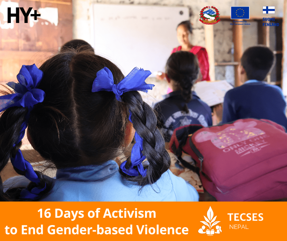 A girl attending a lesson in class with blue bows in her hair